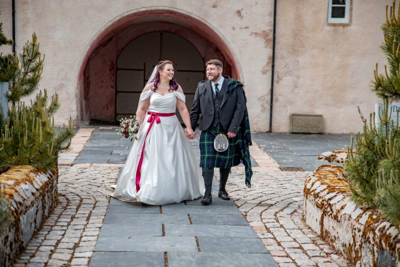 Newly wed Bride and groom. Walking at the Meldrum House grounds